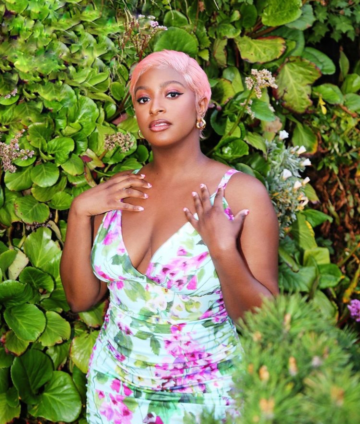DJ Cuppy’s mum, Nana Otedola covers her daughter’s exposed cleavage